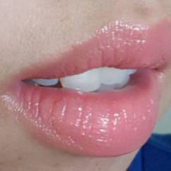 Lip perfector on top of base lipstick.